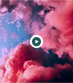 Pink and blue sky with a centered play icon.